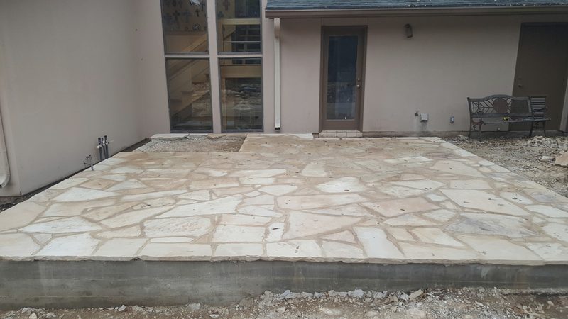 Flagstone patio on a formed slab