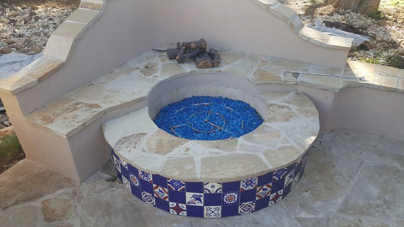 Gas fire pit with Talavera tile and a flagstone cap